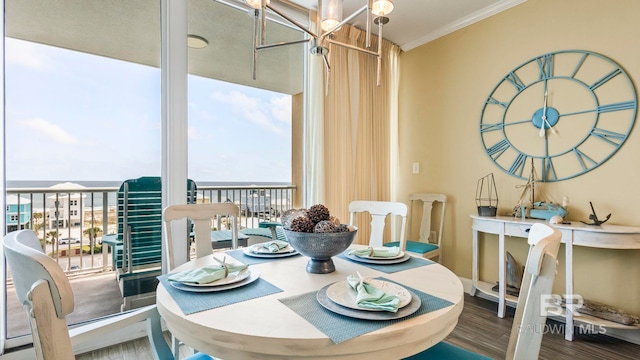 1524 W Beach Blvd Unit 603, Gulf Shores, AL 36542 - dining area featuring expansive windows, wood finished floors, and ornamental molding