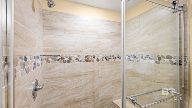 1524 W Beach Blvd Unit 603, Gulf Shores, AL 36542 - bathroom with a tile shower