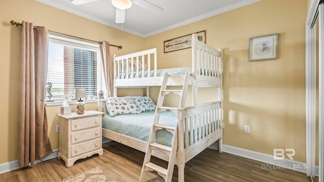 1524 W Beach Blvd Unit 603, Gulf Shores, AL 36542 - bedroom featuring crown molding, wood finished floors, baseboards, and ceiling fan