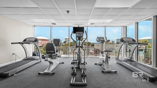 1524 W Beach Blvd Unit 603, Gulf Shores, AL 36542 - exercise room featuring floor to ceiling windows and a drop ceiling