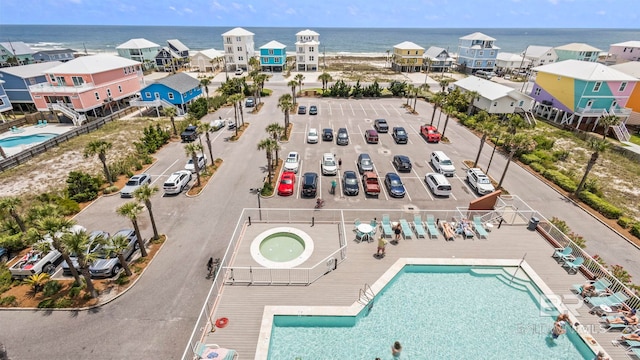 1524 W Beach Blvd Unit 603, Gulf Shores, AL 36542 - bird's eye view of a pool and a nearby body of water