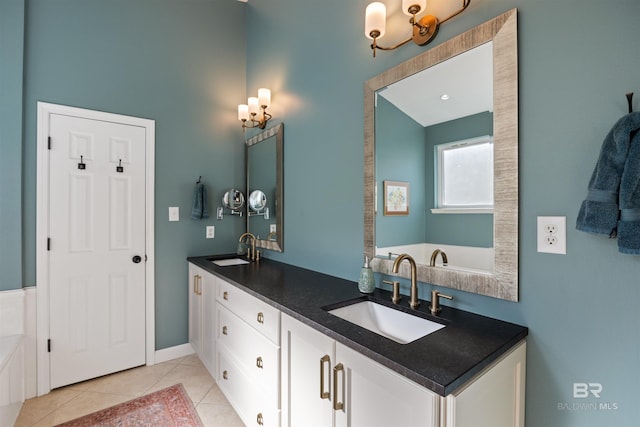 bathroom featuring tile patterned floors and vanity