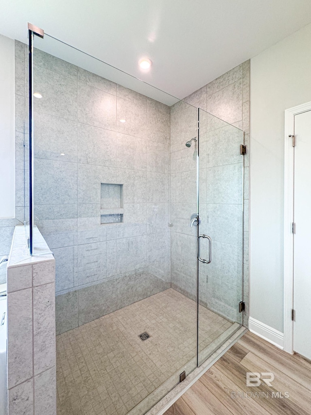 23850 Shadowridge Dr, Daphne, AL 36526 - full bath featuring a stall shower, wood finished floors, and recessed lighting