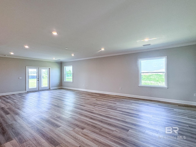 23850 Shadowridge Dr, Daphne, AL 36526 - spare room with crown molding, wood finished floors, baseboards, recessed lighting, and french doors