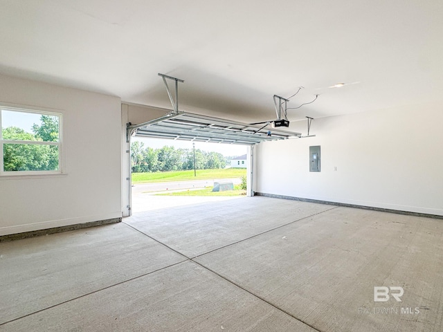 23850 Shadowridge Dr, Daphne, AL 36526 - garage with electric panel, baseboards, and a garage door opener