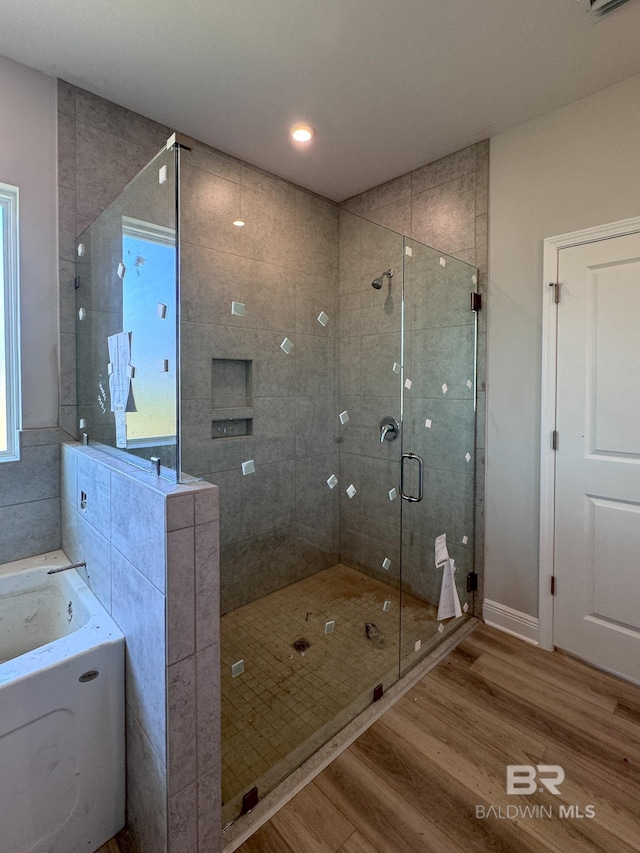 23850 Shadowridge Dr, Daphne, AL 36526 - full bath with wood finished floors, a stall shower, a bath, and recessed lighting