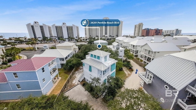 birds eye view of property with a city view