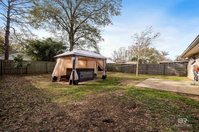 view of yard featuring a gazebo and a patio