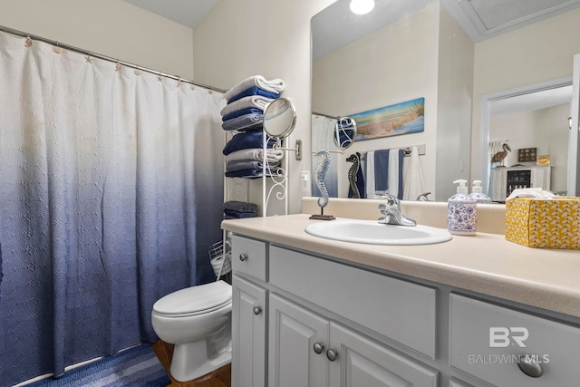 bathroom featuring vanity and toilet