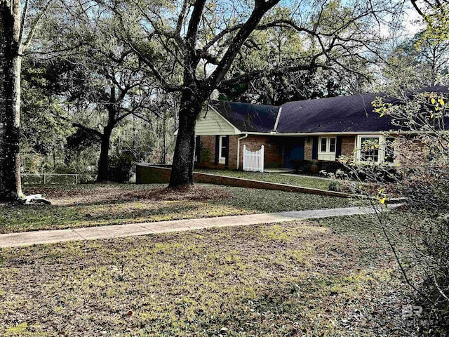 ranch-style home with brick siding