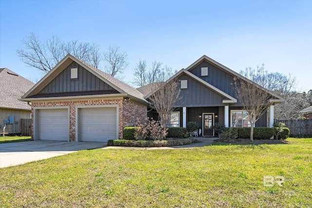 craftsman-style house featuring driveway, brick siding, a front lawn, and board and batten siding