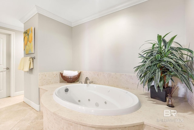 full bath with baseboards, a tub with jets, ornamental molding, and tile patterned flooring