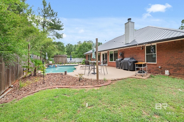 25391 Monarch Ct, Loxley, AL 36551 - view of swimming pool featuring area for grilling and a patio area