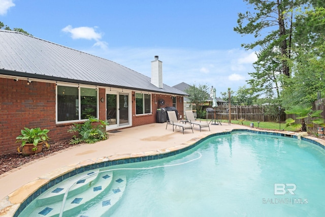 25391 Monarch Ct, Loxley, AL 36551 - view of swimming pool with a patio area and area for grilling
