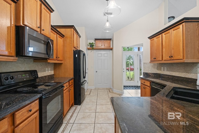25391 Monarch Ct, Loxley, AL 36551 - kitchen featuring black appliances, light tile patterned floors, decorative backsplash, and dark stone counters