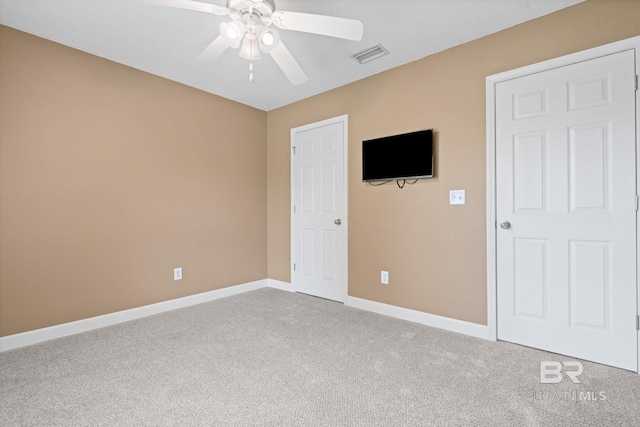 25391 Monarch Ct, Loxley, AL 36551 - unfurnished bedroom featuring carpet floors, baseboards, and a ceiling fan