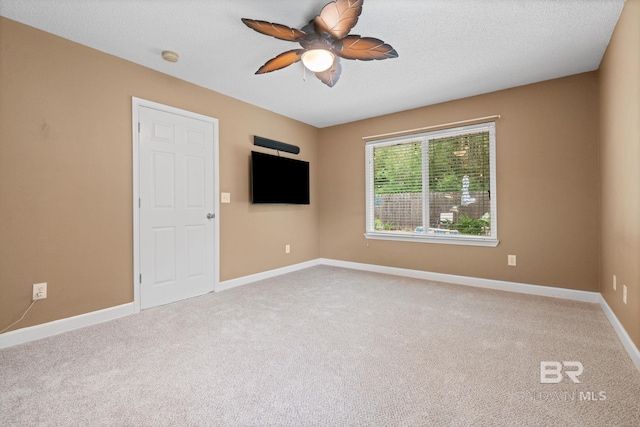 25391 Monarch Ct, Loxley, AL 36551 - empty room with ceiling fan, carpet flooring, and baseboards