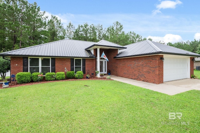 25391 Monarch Ct, Loxley, AL 36551 - single story home with an attached garage, metal roof, and a front yard