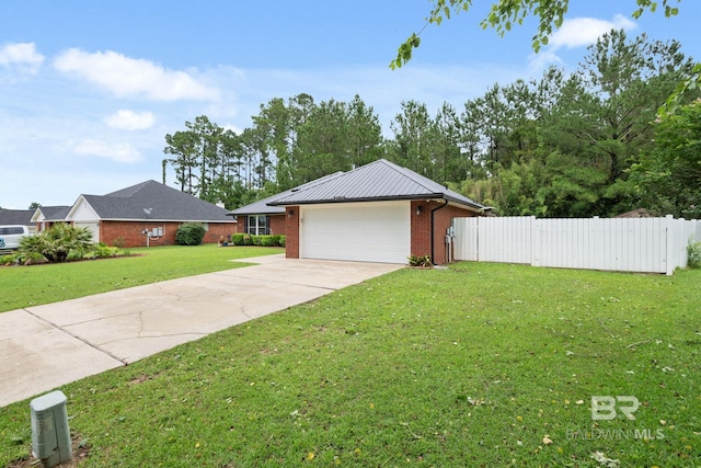 25391 Monarch Ct, Loxley, AL 36551 - view of front of property featuring brick siding, driveway, and an attached garage