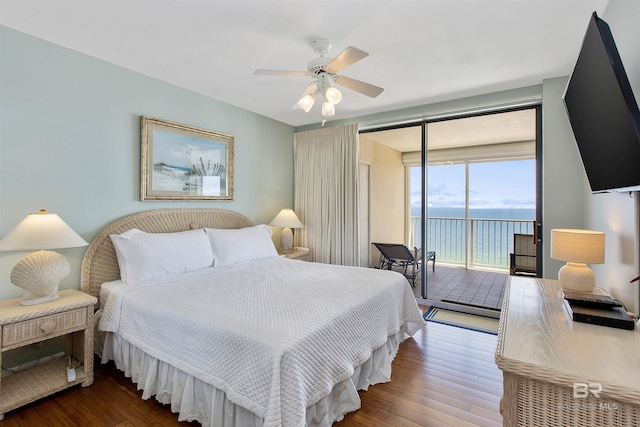 24900 Perdido Beach Blvd Unit 1506, Orange Beach, AL 36561 - bedroom featuring ceiling fan, access to exterior, a wall of windows, and hardwood / wood-style flooring