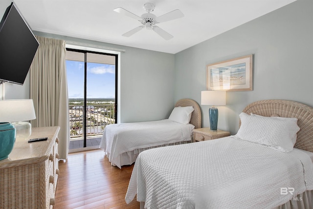 24900 Perdido Beach Blvd Unit 1506, Orange Beach, AL 36561 - bedroom featuring ceiling fan, access to exterior, and light hardwood / wood-style flooring