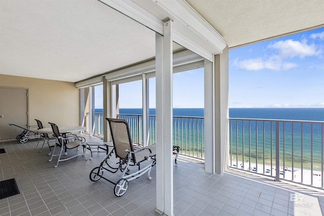24900 Perdido Beach Blvd Unit 1506, Orange Beach, AL 36561 - sunroom with a water view, plenty of natural light, and a beach view