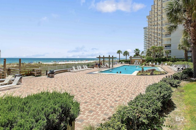 24900 Perdido Beach Blvd Unit 1506, Orange Beach, AL 36561 - view of swimming pool featuring a patio area and a water view