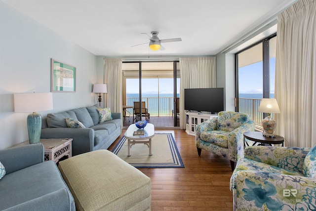 24900 Perdido Beach Blvd Unit 1506, Orange Beach, AL 36561 - living room featuring floor to ceiling windows, dark wood-type flooring, a wealth of natural light, and ceiling fan
