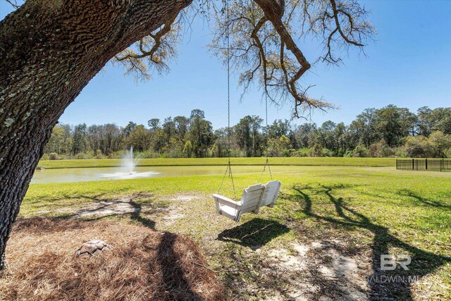 view of yard with a water view