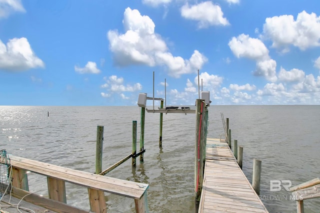 view of dock with a water view and boat lift