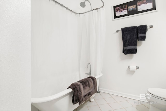 full bathroom with baseboards, curtained shower, tile patterned floors, toilet, and a bathtub