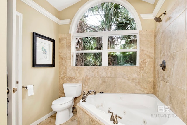 bathroom with tile patterned floors, toilet, and a tub with jets