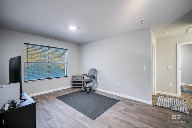 interior space with hardwood / wood-style flooring