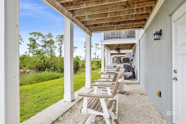 view of property featuring a front lawn