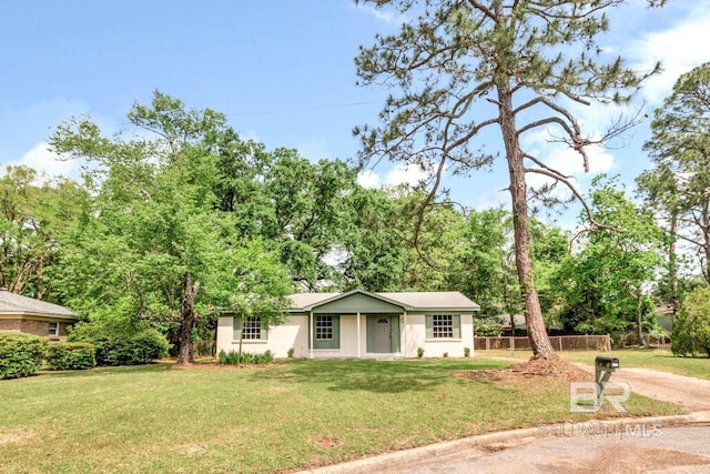 view of front of property with a front lawn