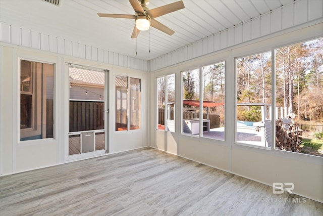 26715 Terry Cove Dr, Orange Beach, AL 36561 - unfurnished sunroom featuring ceiling fan