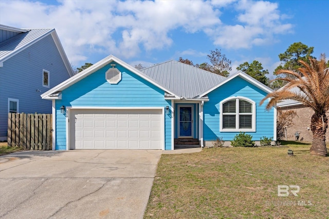 26715 Terry Cove Dr, Orange Beach, AL 36561 - single story home featuring an attached garage, driveway, and metal roof