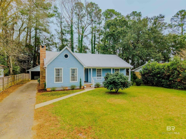 ranch-style home with a carport and a front lawn