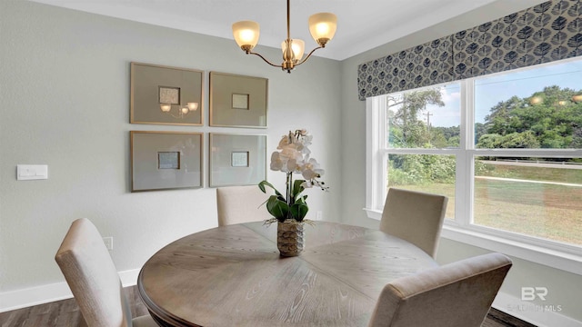 11529 Thistledown Loop, Spanish Fort, AL 36527 - dining area featuring baseboards, a chandelier, and wood finished floors