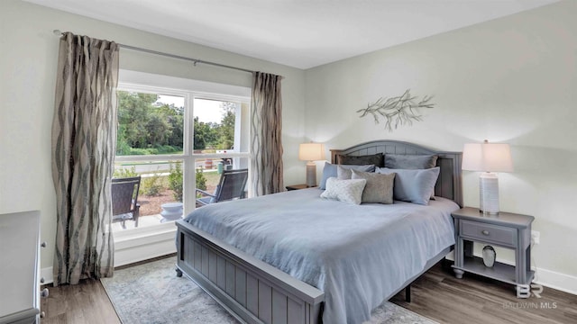 11529 Thistledown Loop, Spanish Fort, AL 36527 - bedroom featuring wood finished floors and baseboards