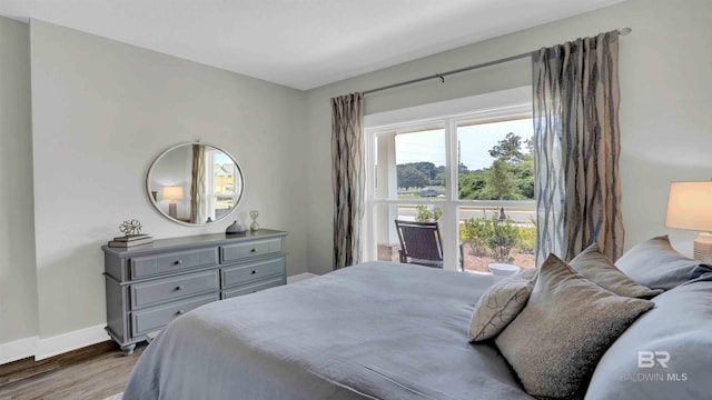 11529 Thistledown Loop, Spanish Fort, AL 36527 - bedroom featuring wood finished floors and baseboards