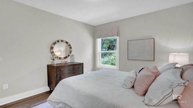 11529 Thistledown Loop, Spanish Fort, AL 36527 - bedroom featuring baseboards and wood finished floors