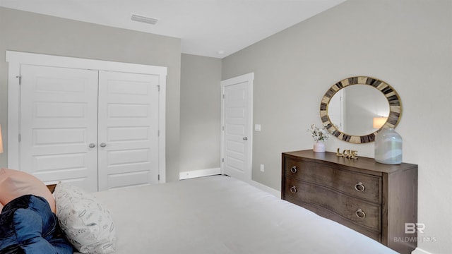 11529 Thistledown Loop, Spanish Fort, AL 36527 - carpeted bedroom featuring baseboards and a closet