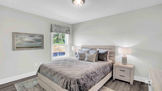 11529 Thistledown Loop, Spanish Fort, AL 36527 - bedroom featuring baseboards and wood finished floors