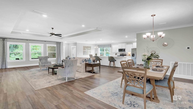 11529 Thistledown Loop, Spanish Fort, AL 36527 - dining room featuring light wood-style floors, a chandelier, ceiling fan, recessed lighting, and ornamental molding