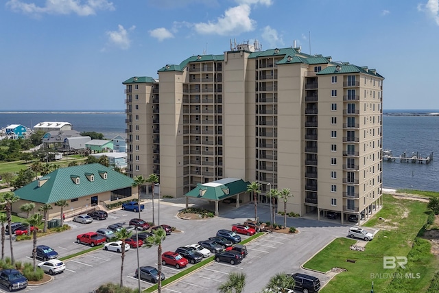 view of building exterior with a water view