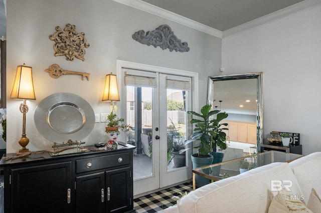 bedroom featuring access to exterior, crown molding, and french doors