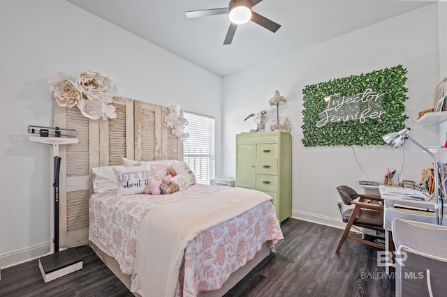 bedroom featuring dark wood-style floors, baseboards, and a ceiling fan