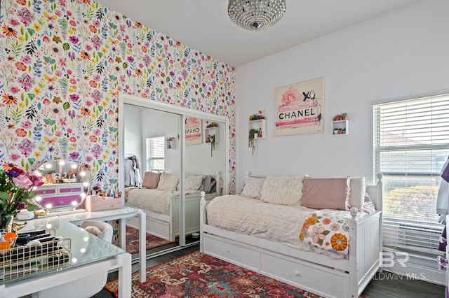 bedroom featuring wood finished floors