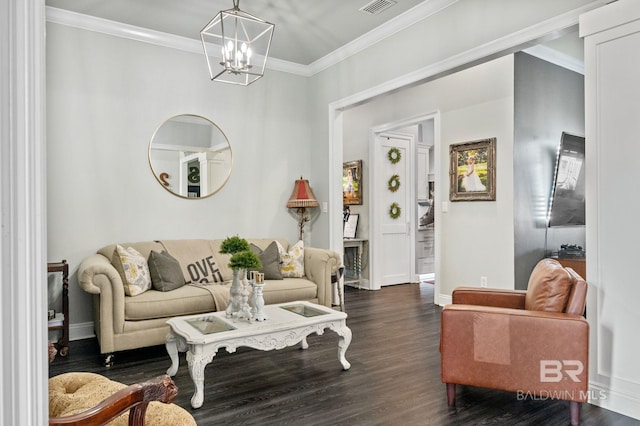 living area with an inviting chandelier, visible vents, ornamental molding, and dark wood-style flooring